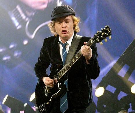 Angus Young performing live with Gibson SG