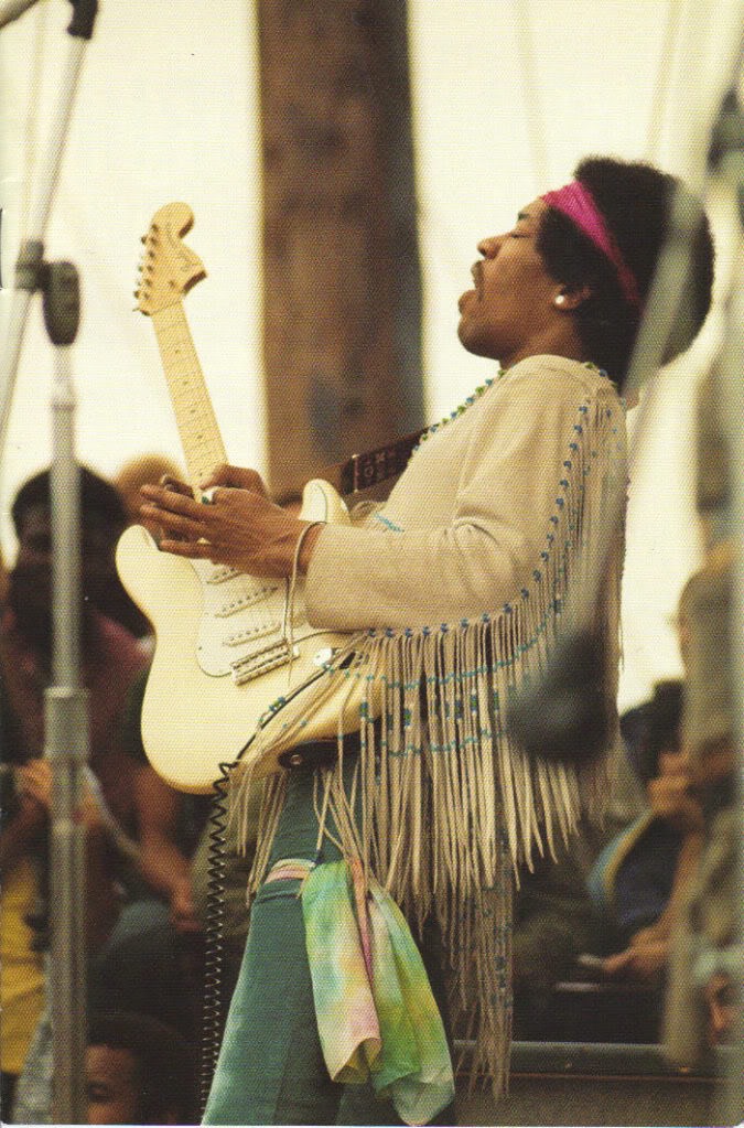 Jimi Hendrix performing at Woodstock